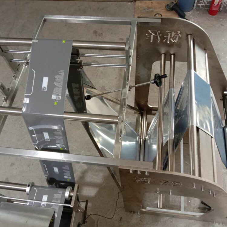 Triangle film forming and balance system of rotary pouch packing machine